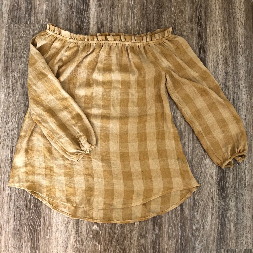 Yellow off-the-shoulder shirt